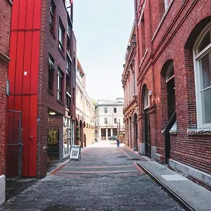 Historic Charm In Bc's Waddington Alley Apartment Victoria